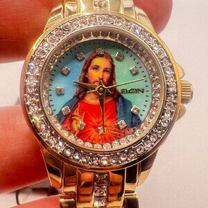 Elgin extra small watch for ladies , Jesus Figure , Brand New Battery Inside